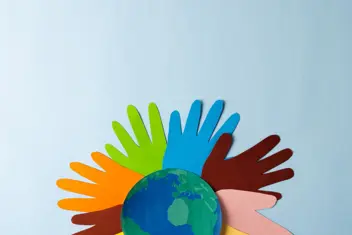 Colorful Paper Hands Around World On Blue Backgrou 2026 03 25 02 16 26 Utc 1